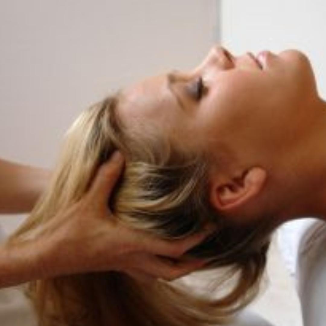 Photo of woman getting a cranial sacral massage